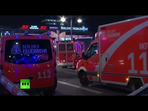 Truck plows into Christmas market in Berlin in likely terrorist attack - aftermath