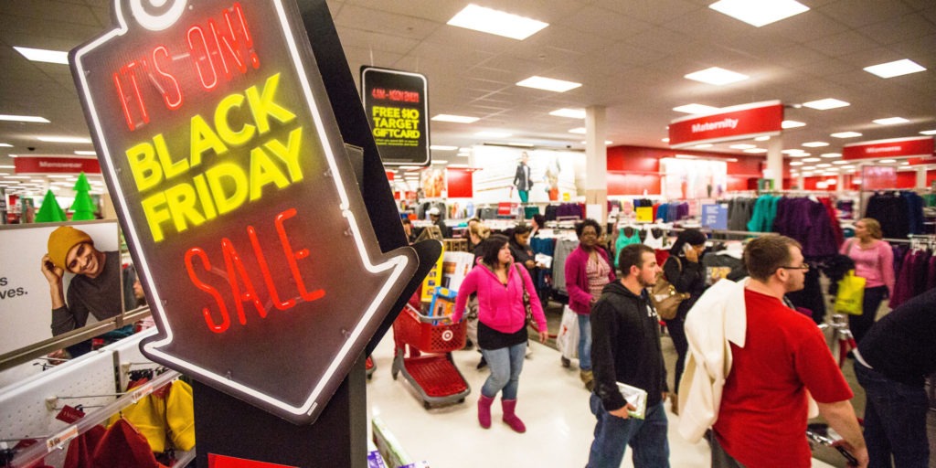 BRAINTREE, MA - NOVEMBER 23: Shoppers hurried through the aisles in Target during Black Friday at South Shore Plaza in Braintree. (Photo by Aram Boghosian for The Boston Globe via Getty Images)